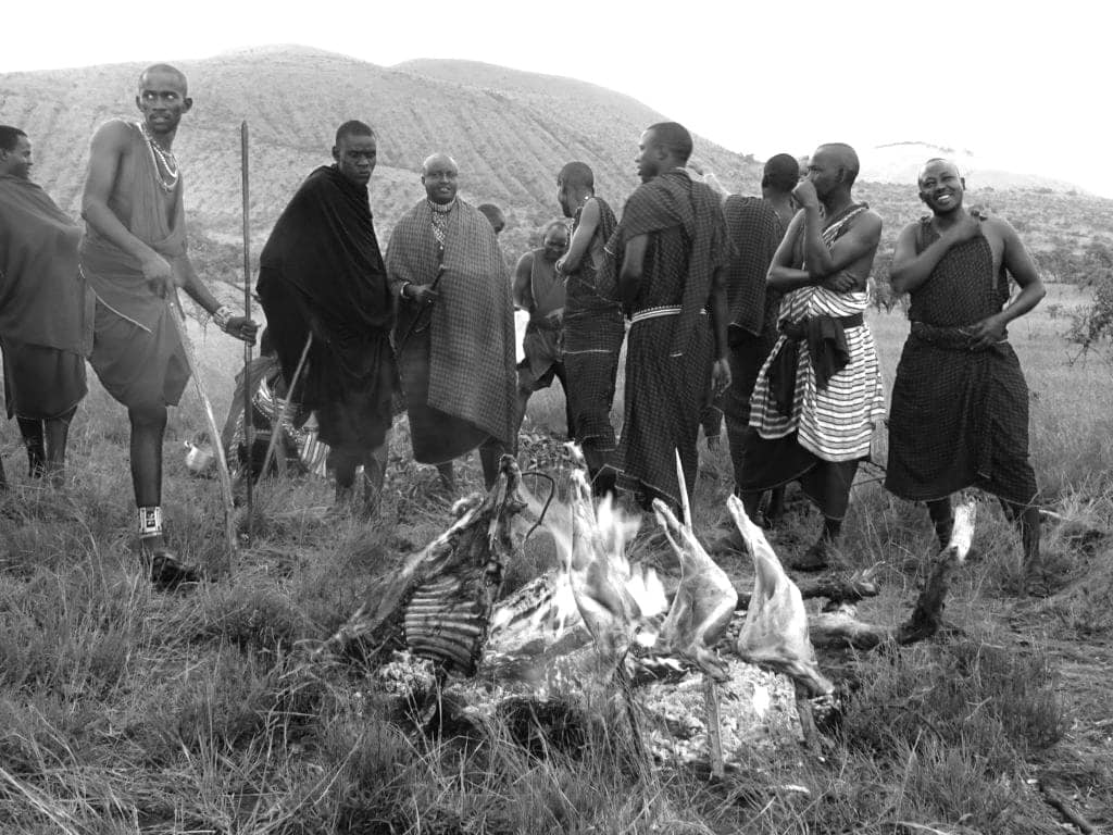 Maasai grilling meat