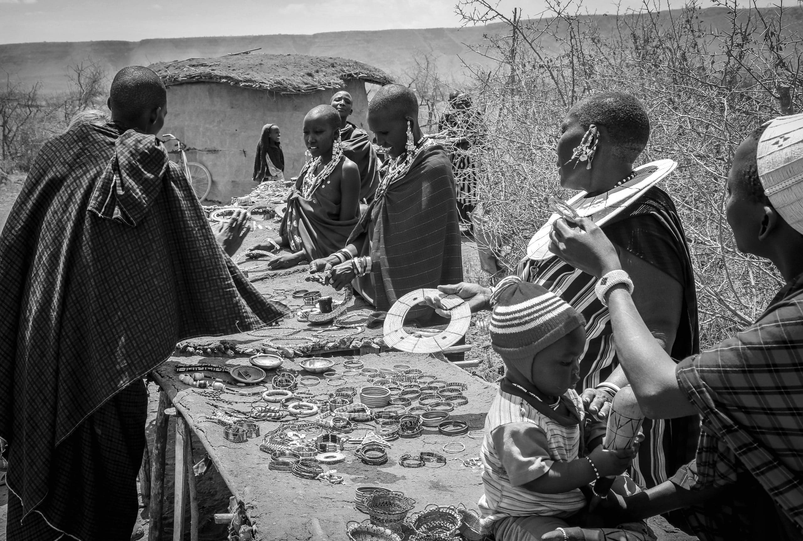 Maasai women selling necklaces and their beauty accessories