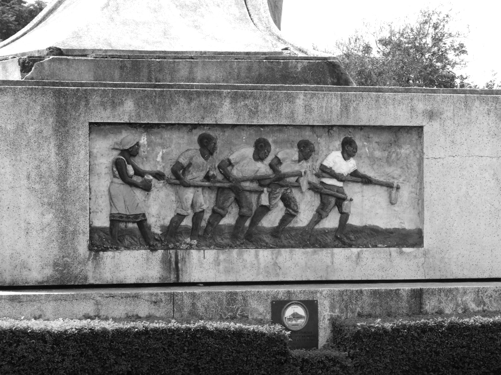 Arusha Declaration Monument - A mural depicting farmers working on a farm