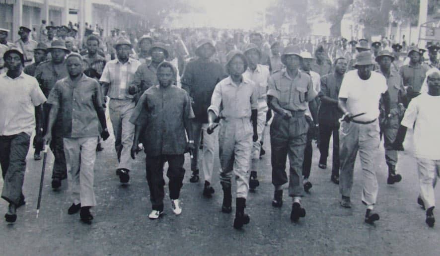 Nyerere and people marching