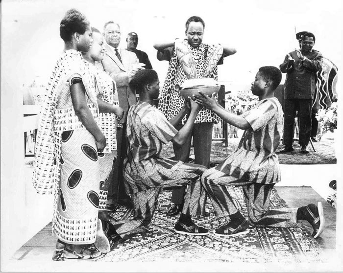 President Nyerere on the first Union day, 1964 - putting together sand from Zanzibar and Tanganyika to signify the Union of the two countries