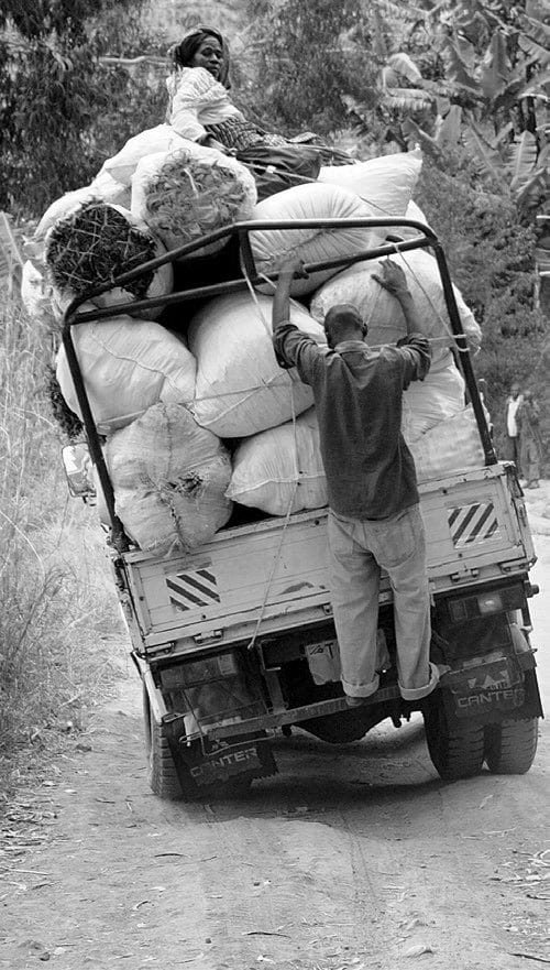 A small truck in Tanzania trying to navigate one of the unpaved bad roads in the country