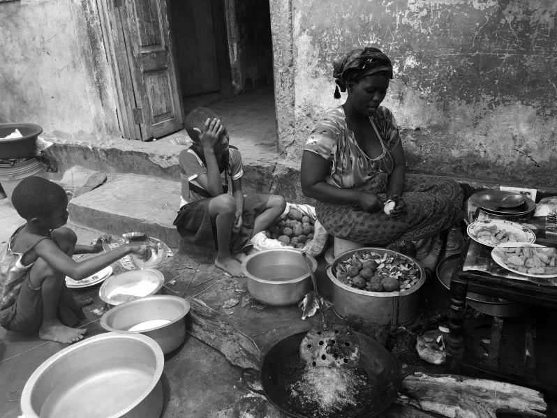 Local woman in Tanzania cooking for her family