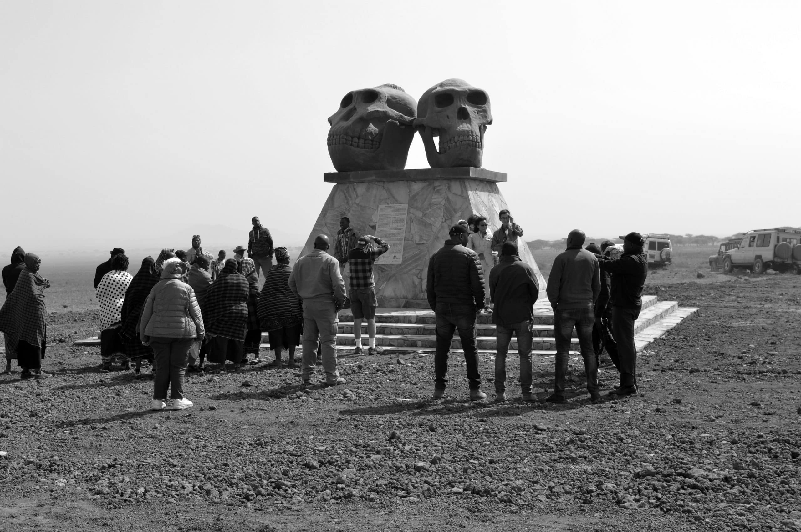 Tourists looking at Olduvai monument