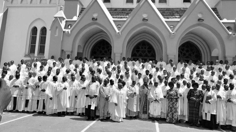 Some of the Roman Catholic priests in Tanzania taking a photo at Saint Joseph Cathedral in Dar es salaam