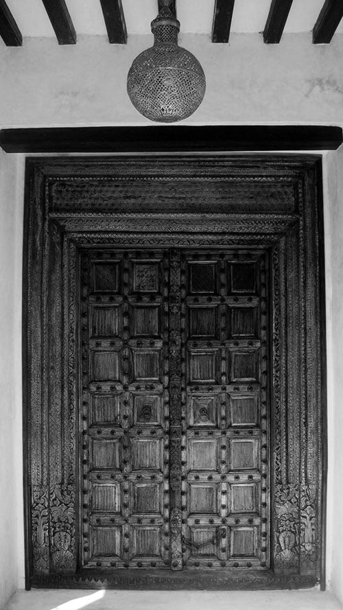 Wooden door carved in Swahili style of architecture in Lamu, Kenya