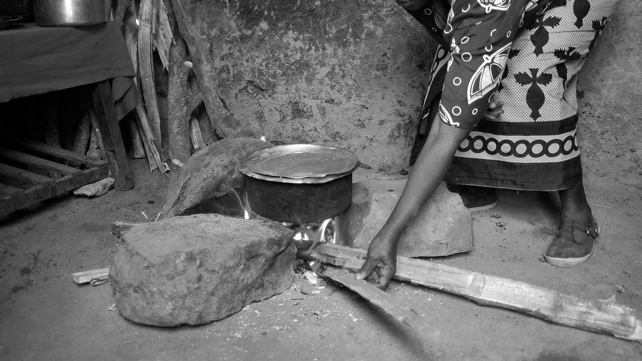 A typical and traditional ways most Tanzanias in rural areas fuel their cooking stoves - with wood