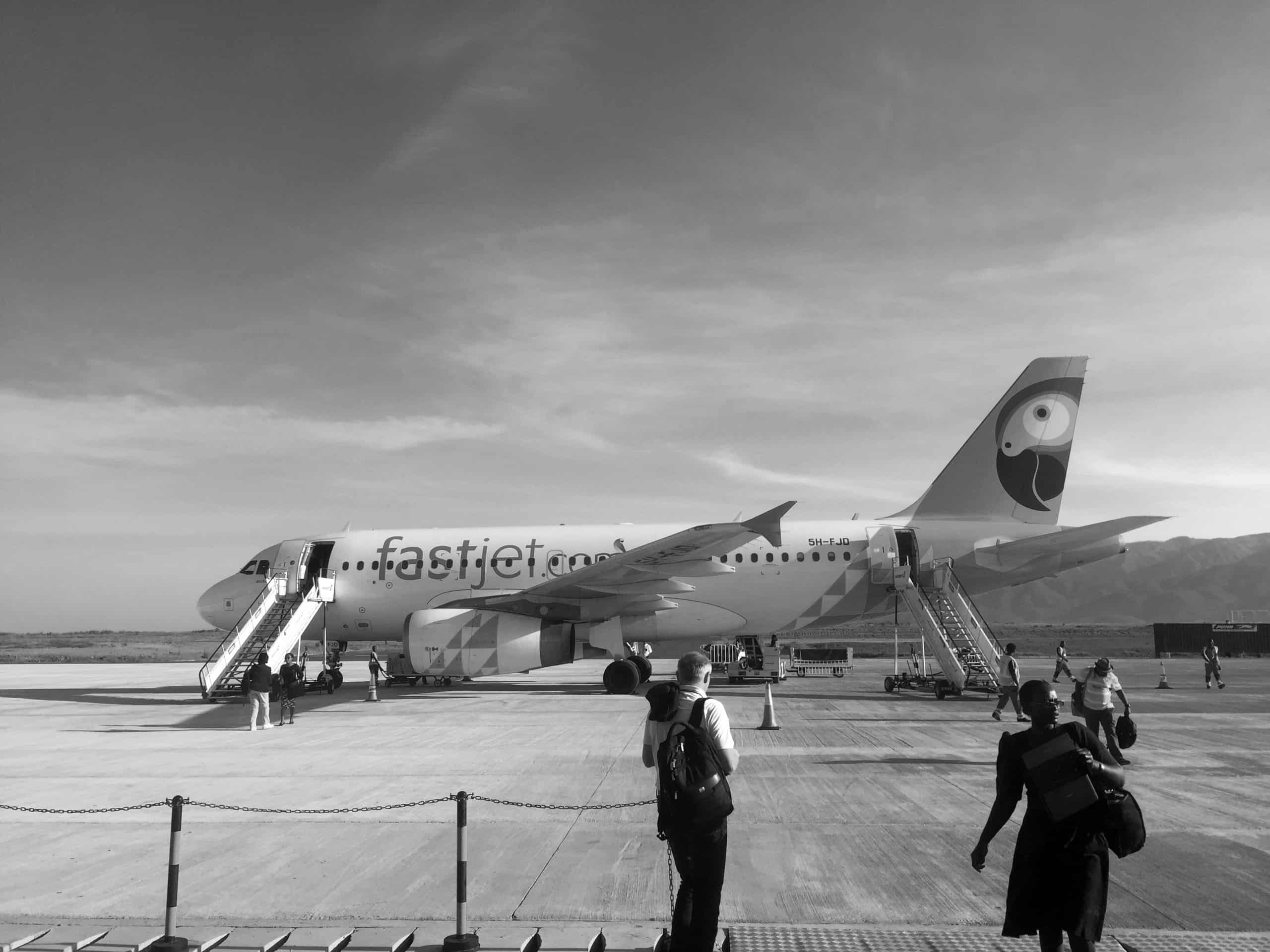 Plane waiting for passengers at Songwe airport, ready for departure