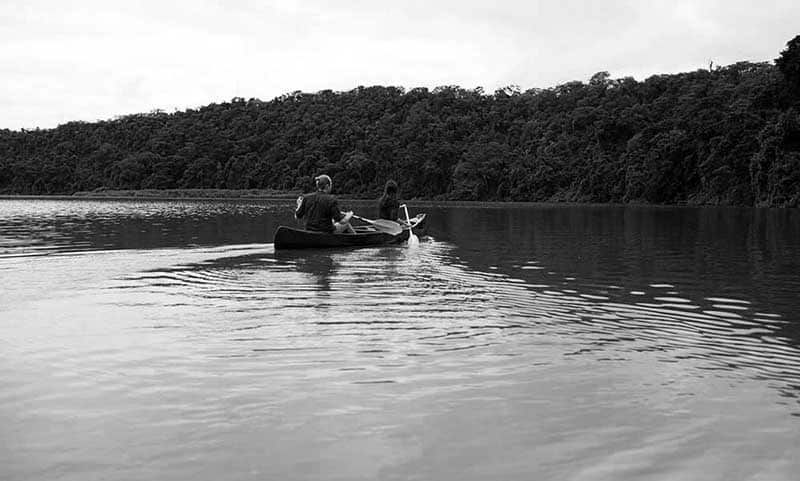 Tourists Canoeing on Lake Duluti