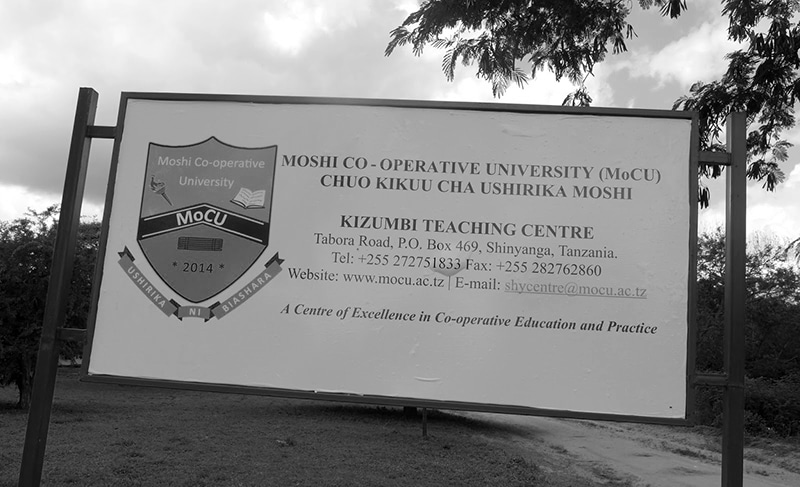 Kizumbi Institute of Cooperative road sign