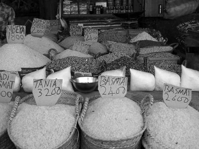 Rice of different types on display in a market in Stone Town Zanzibar