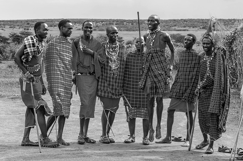 The Maasai men singing and dancing