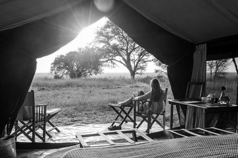 Tourist resting on one of the Serengeti Safari Camp