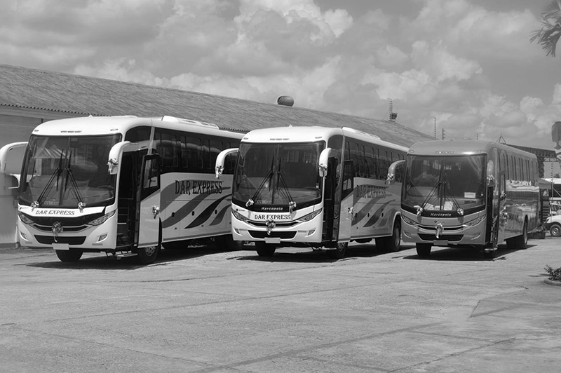 Dar Express Scania buses parking at a bus stop in Dar es Salaam Tanzania
