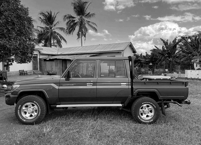 Toyota Landcruiser Double Cabin parking in one of the villages in Tanzania