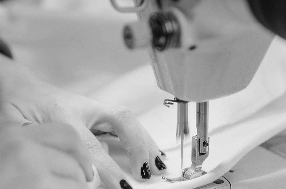 girl sewing with machine