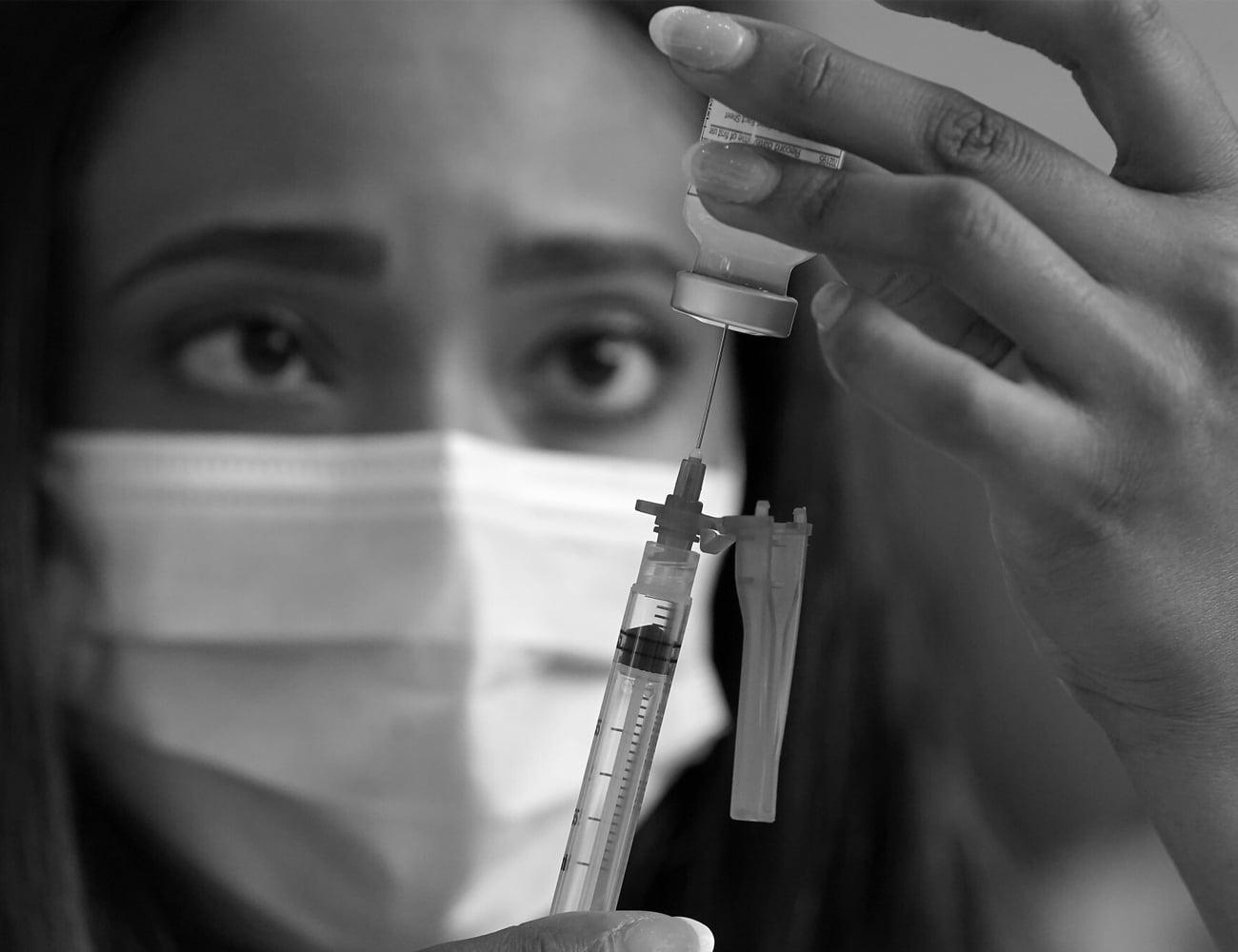 A Doctor Extracting a Vaccine