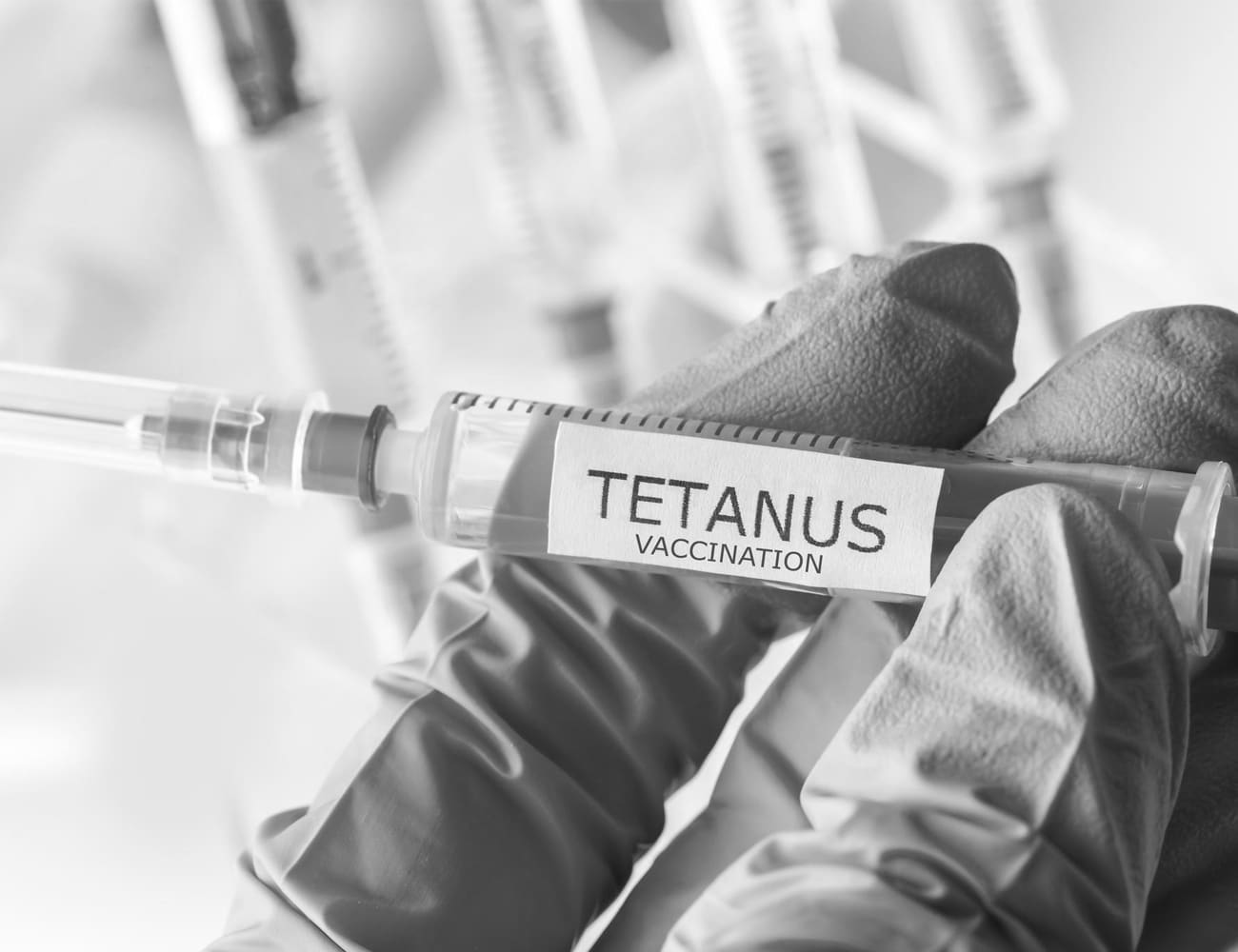 A Person Holding Tetanus Vaccination