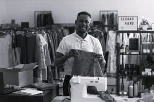 A Small Business Man running a Clothing Store Business