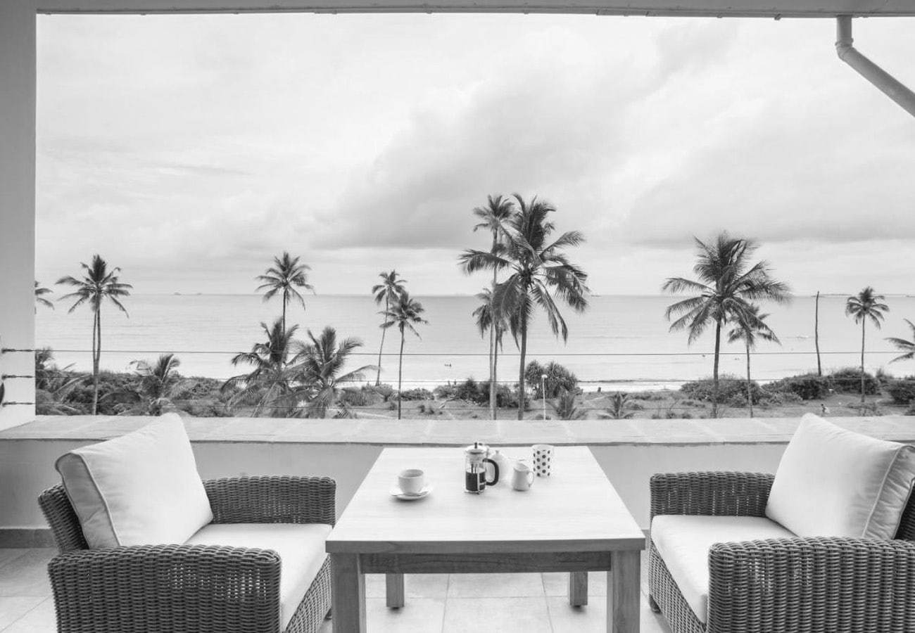 Relaxation Area and a View of the Beach at Oyster Bay Hotel