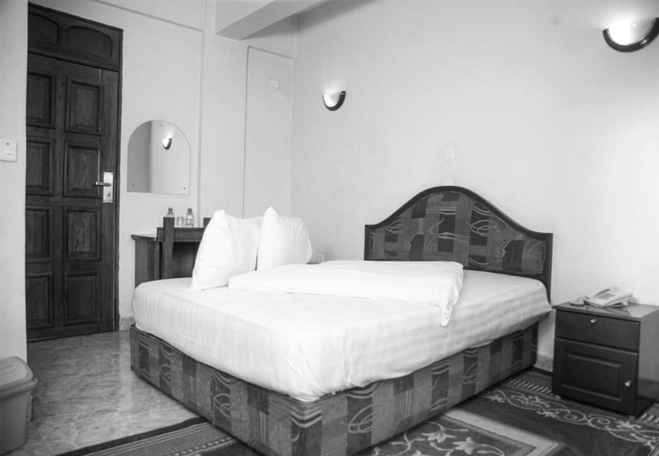 Spacious Bedroom at Natron Palace Hotel