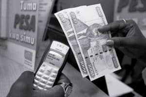 A Person Sending and Receiving money through MPesa