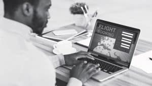 A Traveler booking flight online.