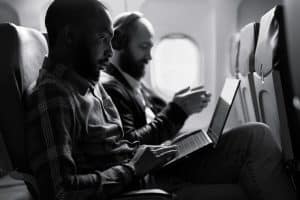 A-passenger-working-on-laptop-during-flight