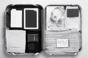 Suitcase with essentials for travel