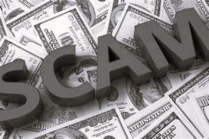Scams alert and US dollars banknotes