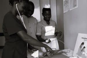 A nurse caring for a child in the hospital
