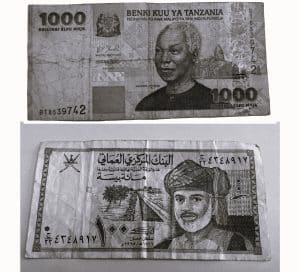 Omani Rial (OMR) and Tanzanian Shilling (TZS) banknote
